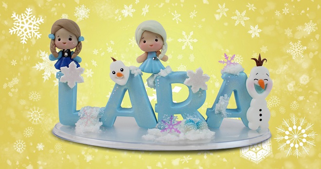 Topo de bolo em biscuit com personagens do filme Frozen - Detalhe Topo de bolo em biscuit com personagens do filme Frozen - Detalhe